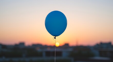 Blue Balloon Floating in the Sky at Sunset, Celebration, Hope, and Joy