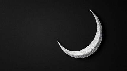 Obraz premium Textured Silver Crescent Moon on Black Backdrop