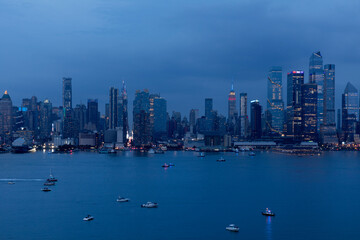 Boats on the Hudson River awaiting July 4th fireworks in New York City