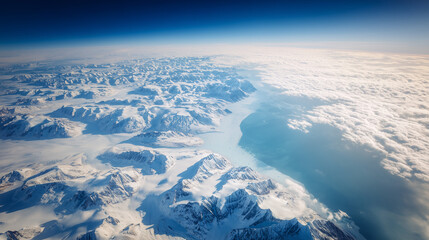 Aerial view of Antarctica's icy coastline with dramatic glaciers meeting the deep blue ocean, vast copy space for text overlay. Polar landscape, climate change, global warming and environmental conser