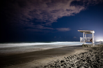 Myrtle Beach beach lifeguard tower at night 