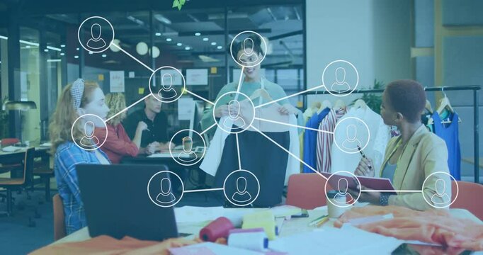 Fashion director presenting skirt while displaying then dissolving network nodes for collaboration