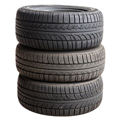 Stack of Three Worn-Out Tires Against Black Background, isolated on a transparent background