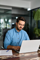Busy professional business man executive, young male corporate worker, latin businessman wearing...