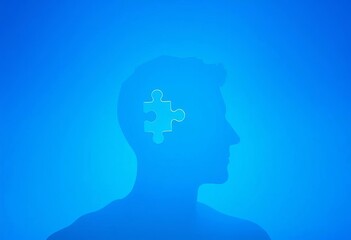 Obraz premium Serene blue background, paper cut head silhouette with missing puzzle piece, missing piece, fragility