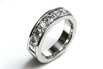 A close up view of a silver ring with diamonds set in a channel on a white background surface