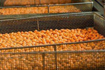 Original name(s): Close-Up of Crispy Roasted Chickpeas – Healthy Snack Idea-Toasted Chickpeas – High-Protein Vegan Snack in Close-Up View