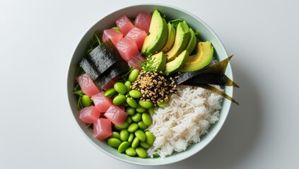 Delicious Tuna Poke Bowl with Fresh Avocado Edamame and Rice on White Surface
