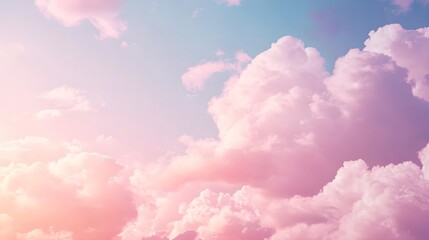 Pastel cloudscape in a soft pink and peach tone.