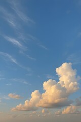 Golden Hour Clouds Against Clear Blue Sky – Peaceful Natural Background