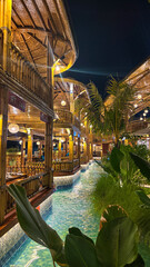 A gazebo in the style of traditional Javanese architecture bamboo gazebo at night