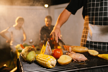 A cheerful summer barbecue gathering with friends and family grilling meat outdoors, enjoying food, laughter, and togetherness in a sunny garden.