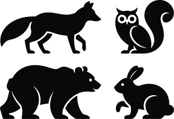 Fototapeta premium Four black silhouette animals: a fox, an owl, a bear, and a rabbit on a white background illustration