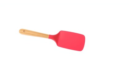 Red silicone spatula with light-brown wooden handle, isolated on white background