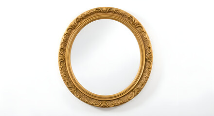 A round wall mirror with a golden frame on a white studio background