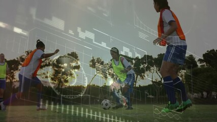 Attacker in green vest dribbling and feinting defender to fall with analytics overlay sunset pitch - Powered by Adobe