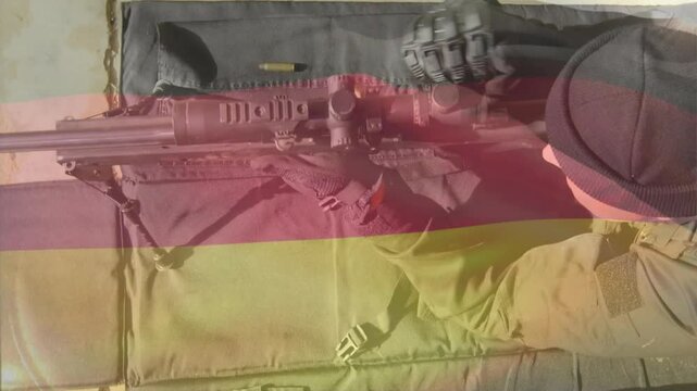 Spotting rounds, shooter inspecting, loading drum magazine and spinning it for firing readiness