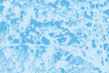 木に咲く花のネガ風シルエット 水色のバリエーション