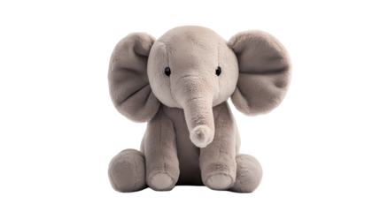 A plush gray elephant with large ears and a trunk sitting upright  in soft lighting isolated on transparent background