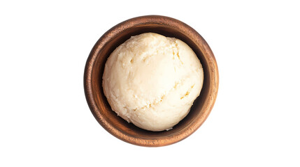 A top view of a wooden bowl filled with a ball of shea butter on a black isolated background isolated on transparent background
