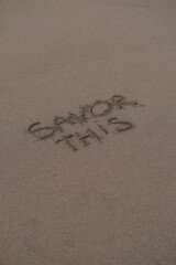 Savor This – Handwritten Message on Volcanic Sand