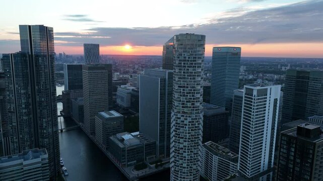  One Park Drive and South Quay Plaza in Canary Wharf at sunrise, Crane down shot, London UK