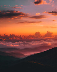 The sky is orange and the clouds are white