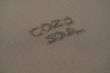 Cozy Soul – Handwritten Message on Volcanic Sand