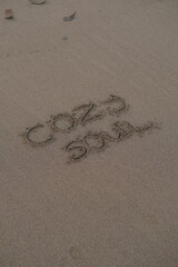 Cozy Soul – Handwritten Message on Volcanic Sand