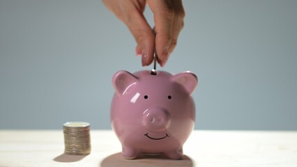 Saving money action home financial planning content indoor environment close-up viewpoint personal finance concept for budgeting and savings strategies