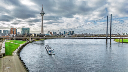 Dusseldorf city skyline aerial drone view from above, Medienhafen, bridge and river Rhine, Germany 