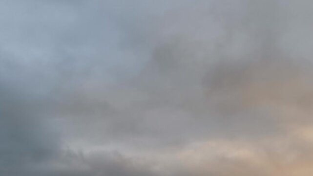 Strange gray sky at sunset