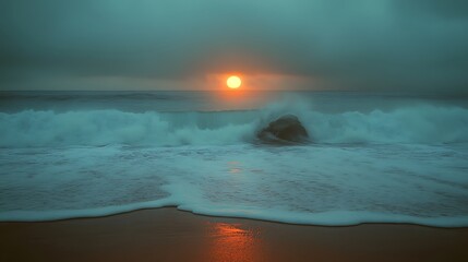 Dramatic sunset over turbulent ocean waves