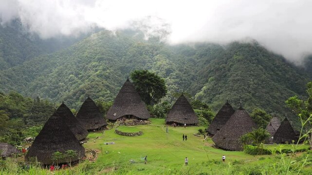 Wae Rebo traditional village the house roofs covered with straw remote indonesian village Labuan Bajo Indonesia
