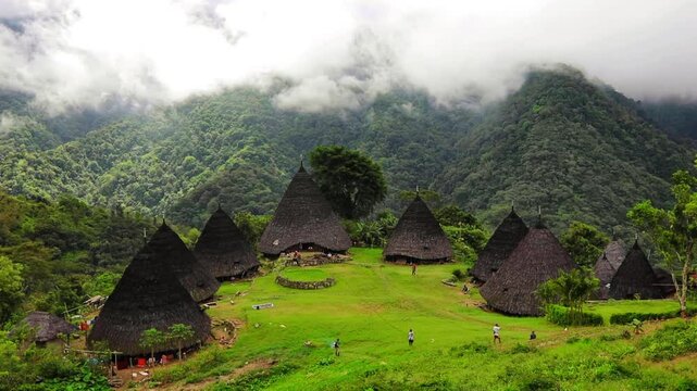 Wae Rebo traditional village the house roofs covered with straw remote indonesian village Labuan Bajo Indonesia