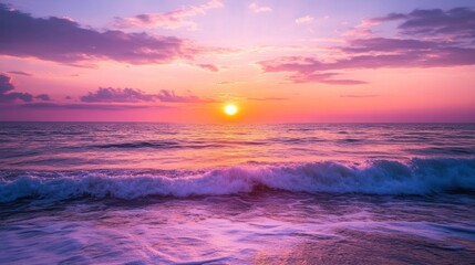 Fototapeta premium Idyllic ocean sunset with colorful hues painting across the sky and waves