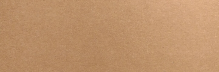 Brown recycled paper background, texture close-up. Recyclable material stock photo. 