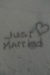 Just Married Text and Heart on Volcanic Black Sand Beach