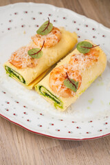 Delicious shrimp rolls with spinach and cheese