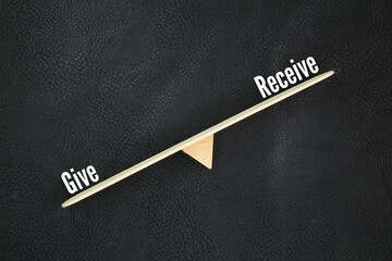 The balance of the two words give or receive. The concept of giving is better than receiving.