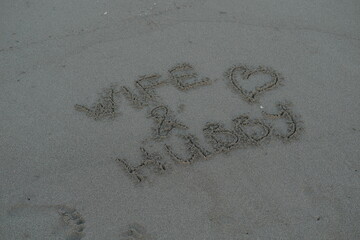 Wife & Hubby Message on Volcanic Sand with Heart Symbol