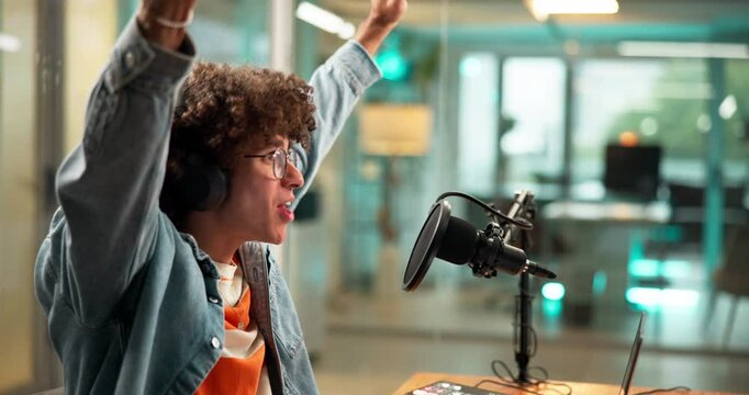 Happy man, announcer or winning with headphones for sport broadcast or radio announcement at office. Male person, commentator or caster talking on mic with victory or good news for audio podcast