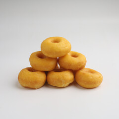 Pile of donuts on white background