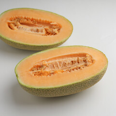 Sliced melon on white background