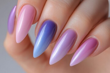 Glamour woman hand with nude nail polish on her fingernails. Nude shade nail manicure with gel polish at luxury beauty salon. Nail art and design. Female hand model. French