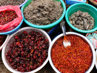 Burmese traditional street food, snacks and sweets at a fresh market and street vendors