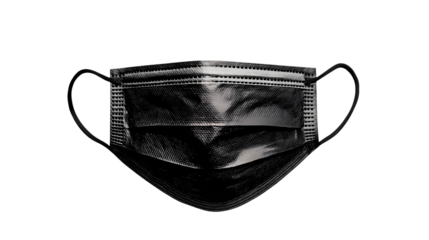 A close up shot of a black disposable face mask  a dark  with ear loops isolated on transparent background