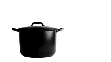 A close up of a black cooking pot with a lid on it in a dark setting with a plain  isolated on transparent background