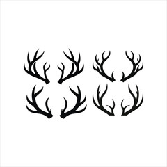 Simple silhouette illustration of several sets of elegant deer antler designs in black and white