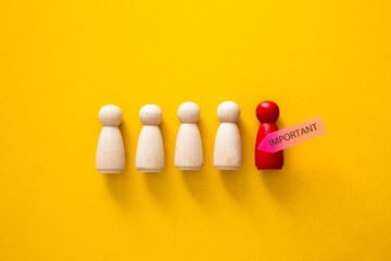 Stand out figure with important label on yellow background